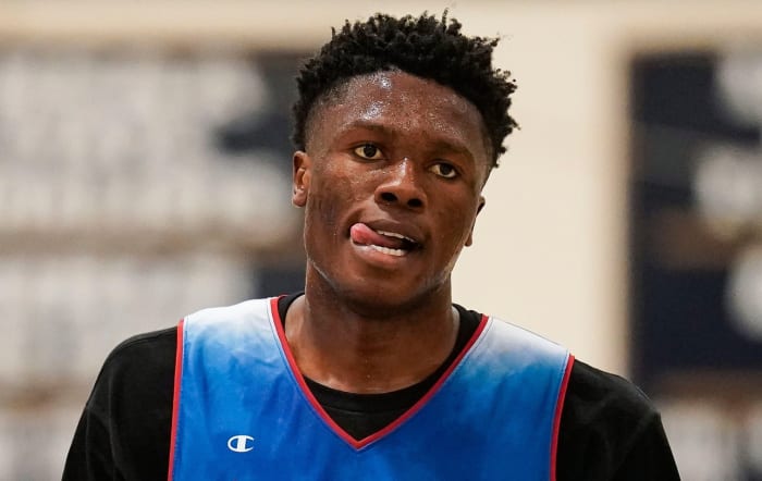 Indiana All-Star Junior Flory Bidunga (20) walks across the court Wednesday, June 7, 2023, during the Indiana All-Stars vs. Juniors boys game at Cathedral High School in Indianapolis.